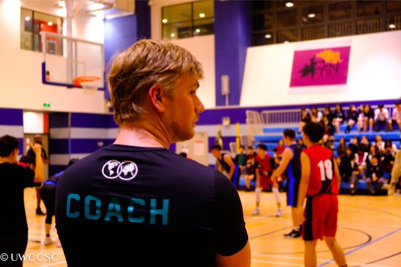Basketball coaching session on the court
